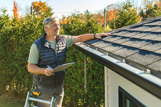 Professional Roofing technician working in Bell, FL